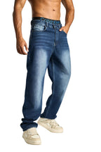 My Store baggy fit dark blue denim jeans worn by a man with a faded wash and relaxed silhouette