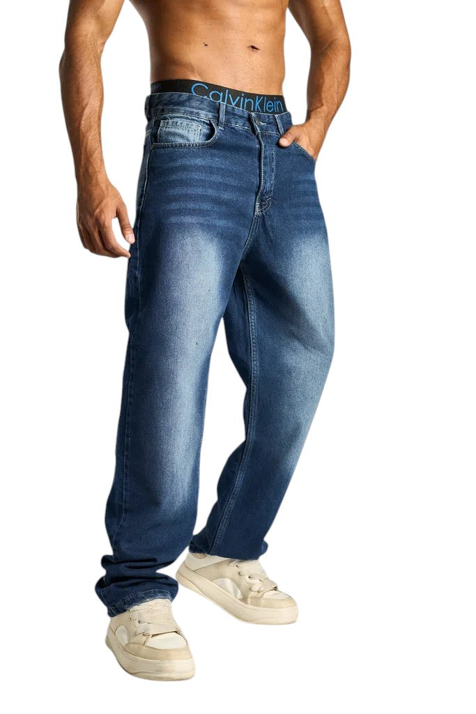 My Store baggy fit dark blue denim jeans worn by a man with a faded wash and relaxed silhouette