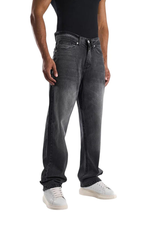 My Store dark gray washed baggy fit jeans with an ultra-wide leg silhouette worn by a model with white sneakers