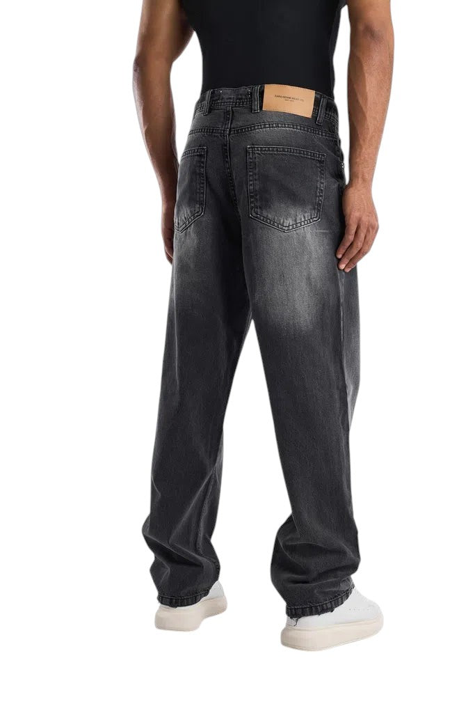 My Store dark gray washed baggy fit jeans with an ultra-wide leg silhouette worn by a model from the back view