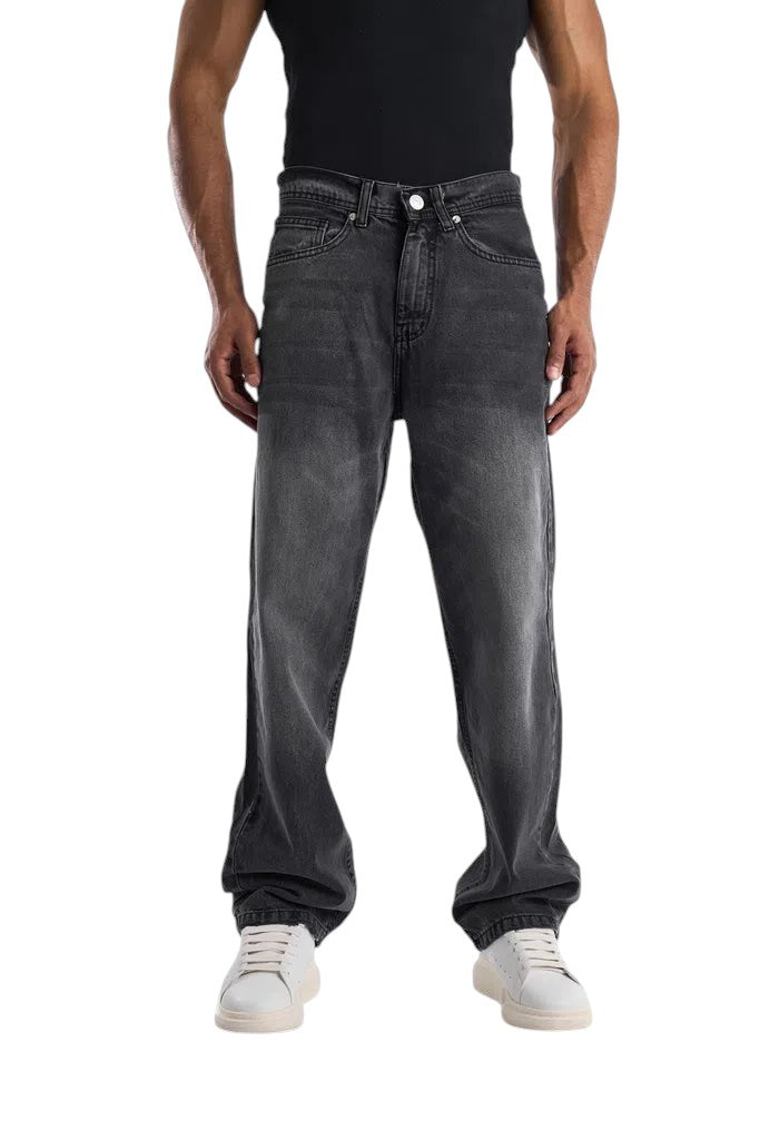 My Store dark gray washed baggy fit jeans with an ultra-wide leg silhouette worn by a model in white sneakers