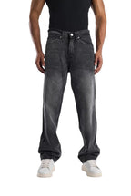 My Store dark gray washed baggy fit jeans with an ultra-wide leg silhouette worn by a model in white sneakers