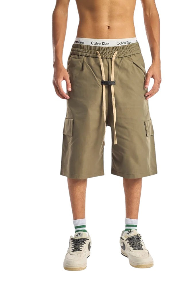 My Store olive Essentials cargo shorts with an elastic waistband and drawstring, worn by a model.