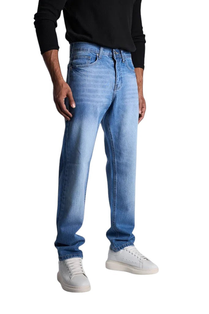 My Store relaxed fit mid blue denim jeans worn by a man with a black long-sleeve shirt and white sneakers