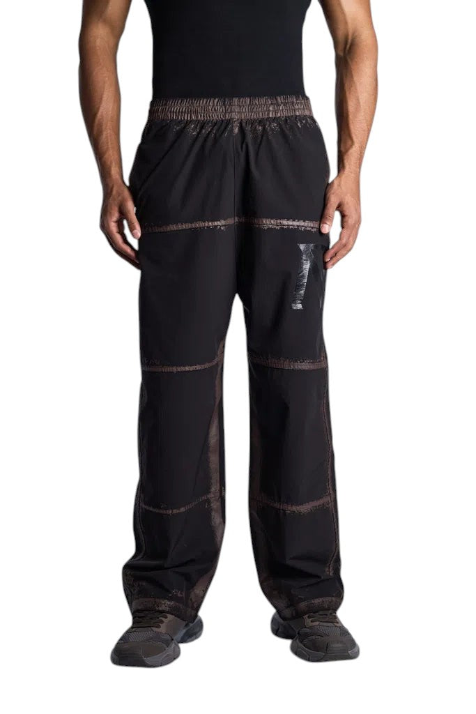 My Store Represent sweatpants in black with distressed brown panel detailing and an elasticated waistband