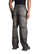 My Store Represent sweatpants in a faded grey wash with a relaxed fit and horizontal seam detailing, back view.