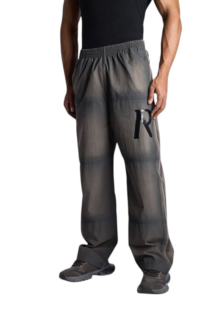My Store Represent sweatpants in a faded grey wash with a black R logo on the leg and an elastic waistband