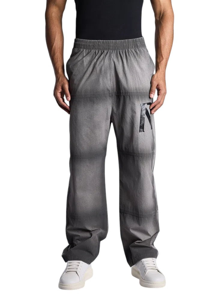 My Store Represent sweatpants in a grey washed finish with a relaxed fit and black logo detail on the left leg