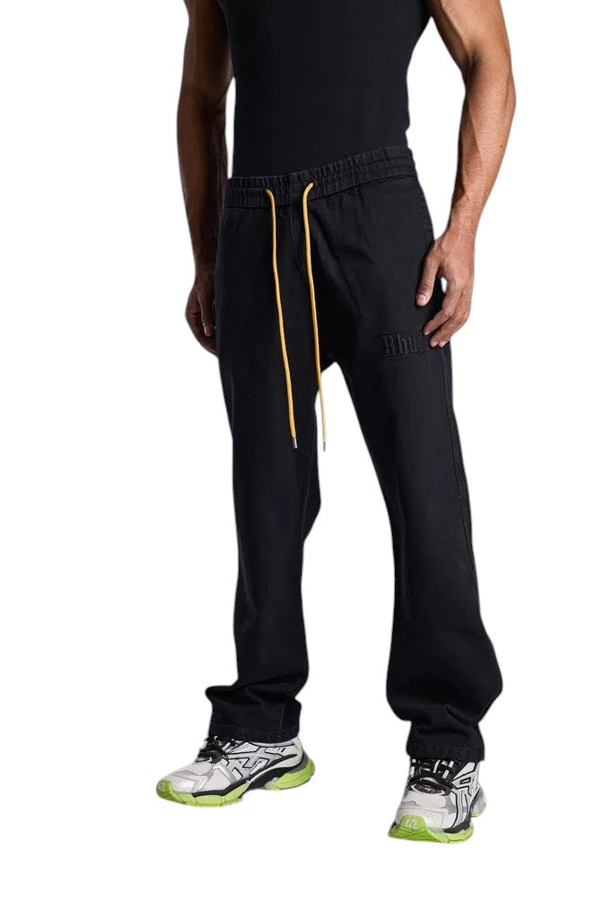 My Store Rhude wide leg black denim pants with yellow drawstring and embroidered logo on a model