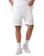My Store white linen shorts with a drawstring waist worn by a man with white sneakers and socks